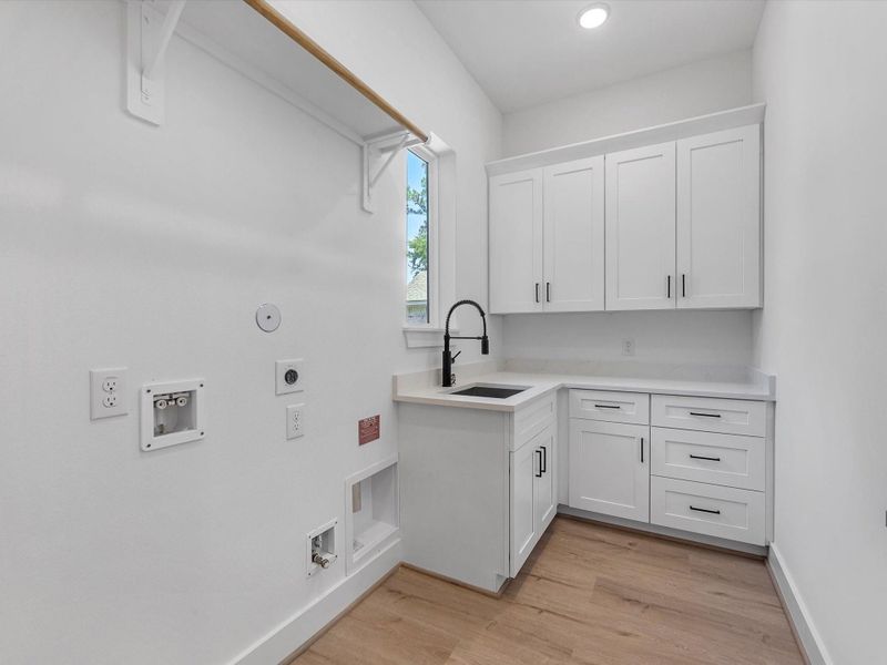 Functional utility room with cabinetry and wash sink. Let’s normalize laundry rooms that don’t look like dungeons! Functional utility room with cabinetry and wash sink. Let’s normalize laundry rooms that don’t look like dungeons!