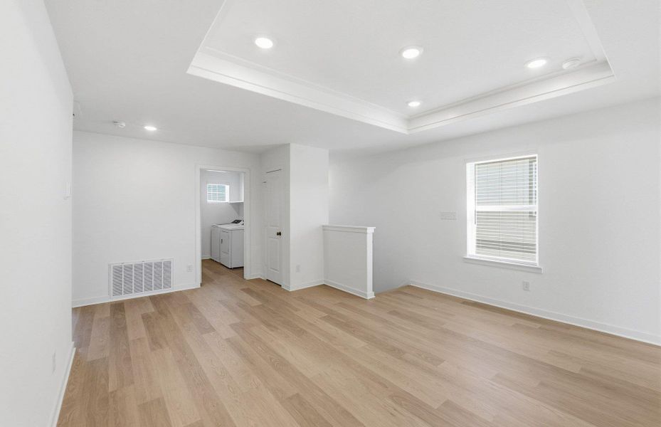 Spacious, unfurnished interior of a new home in Cameron Place, Manor (Image 16).