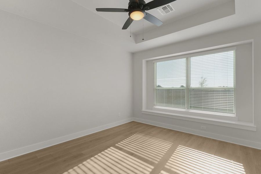 Representative unfurnished interior of a home built from the Barron by Chesmar Homes in Lariat, Liberty Hill (Image 26).