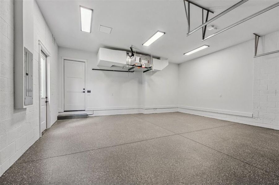 Epoxy floor garage with high ceiling