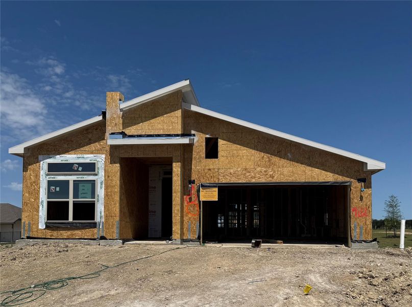 Property in mid-construction with an attached garage Property in mid-construction with an attached garage