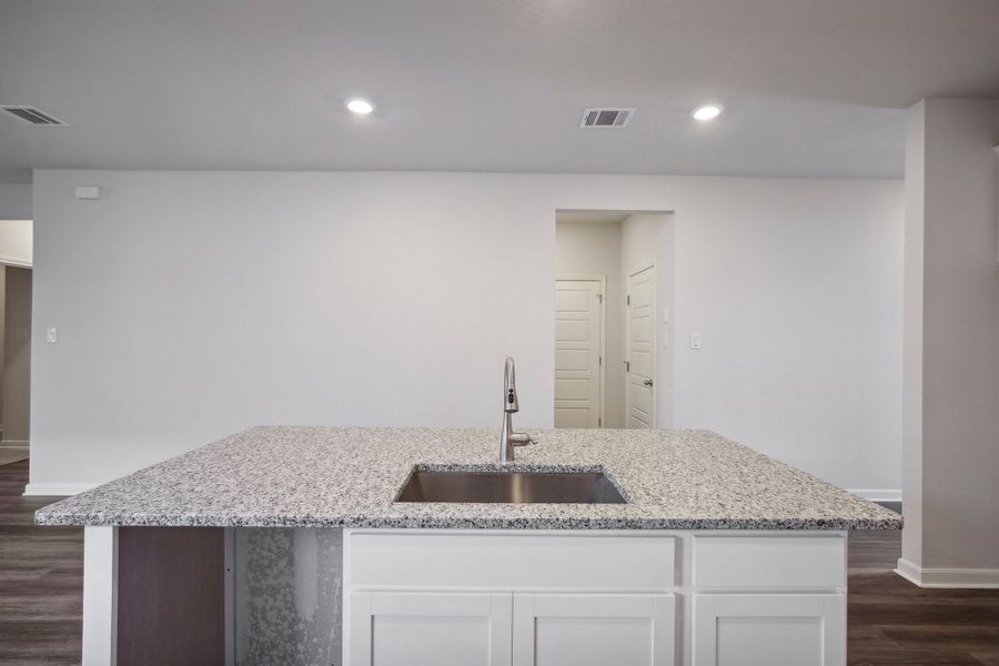 Kitchen in the Allen floorplan at a Meritage Homes community.