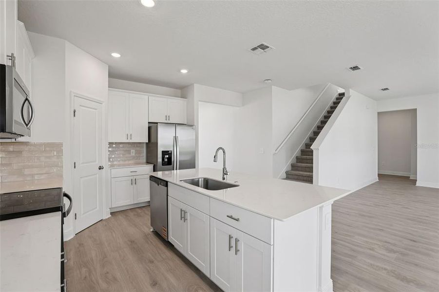 Furnished interior view inside a new home in Cyrene at Minneola, Minneola (Image 9).