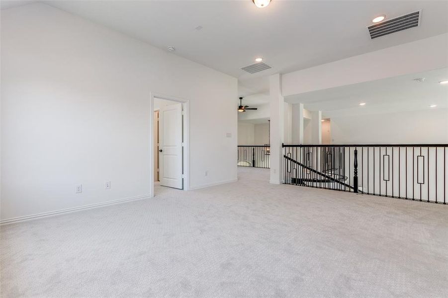 Large game room with window seat.