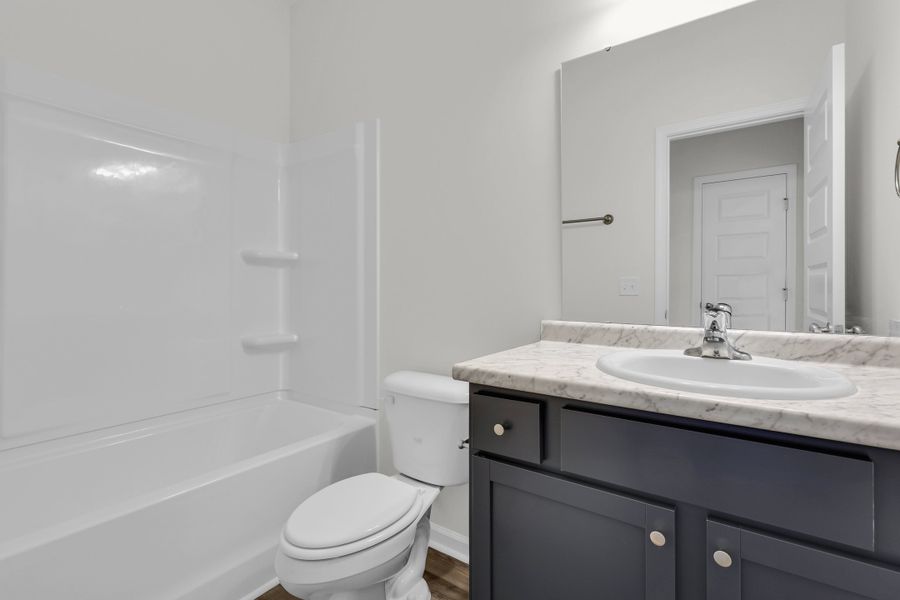 Representative furnished interior of a home built from the The Trask by RTS Homes in Tibet Road at Sassafras, Allenhurst (Image 14).