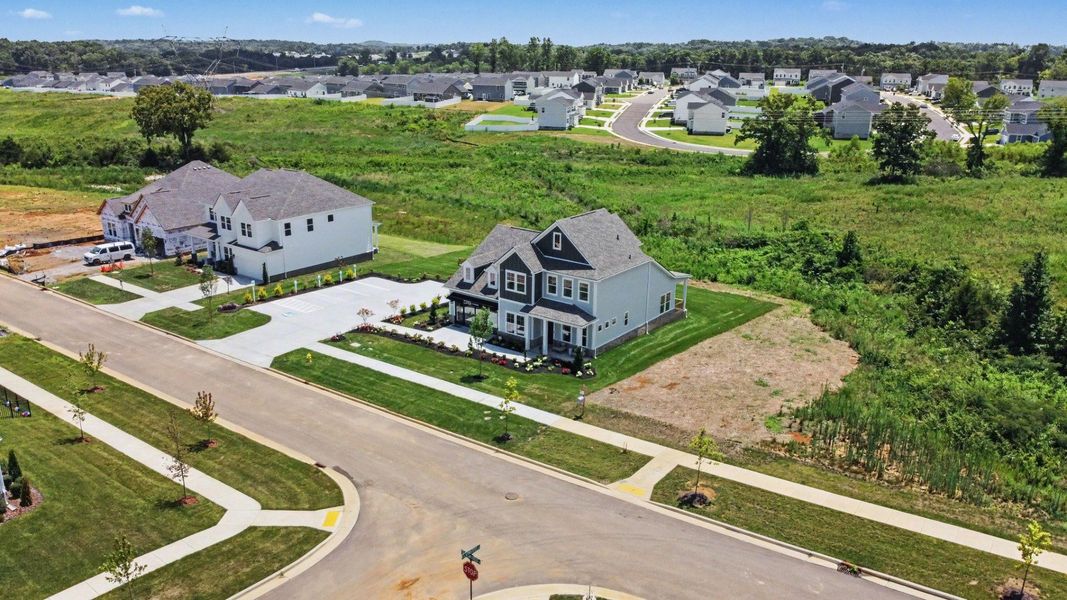 View of community with focus on model home
