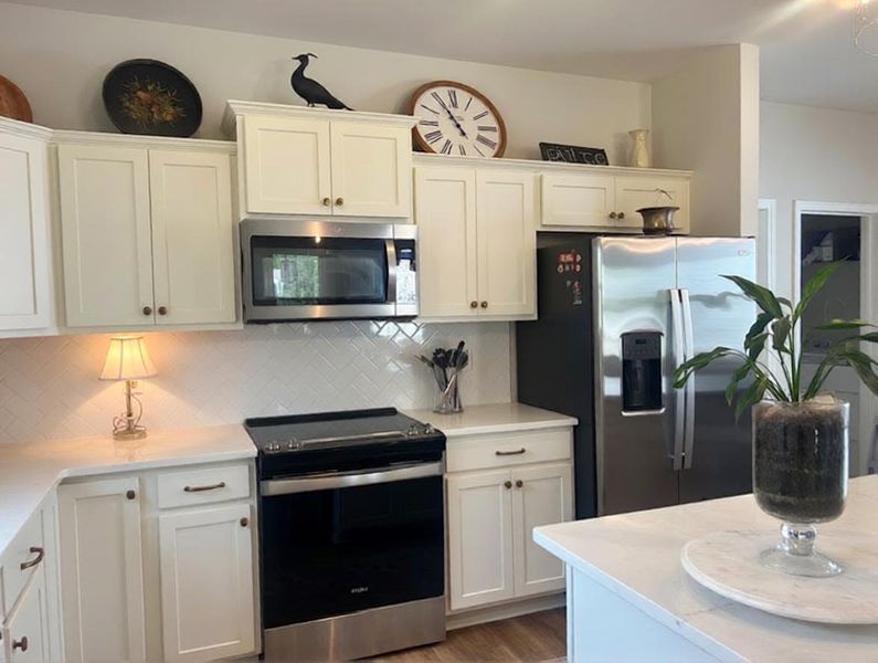 Furnished interior view inside a new home in , Okatie (Image 6).