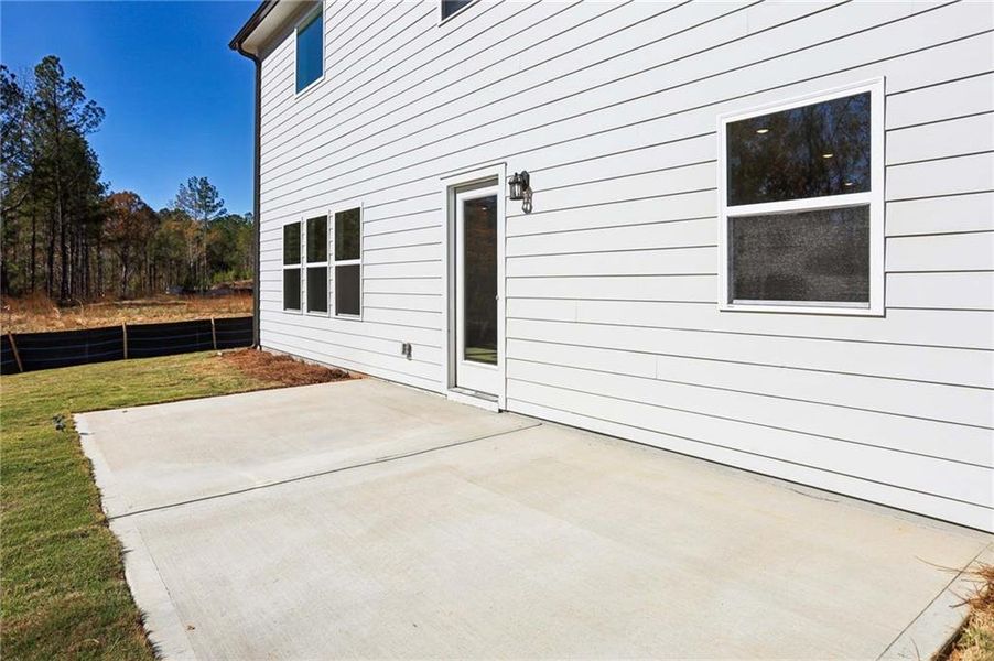 Exterior details and patio area of a home in Arbors at Richland Creek, Buford (Image 4).