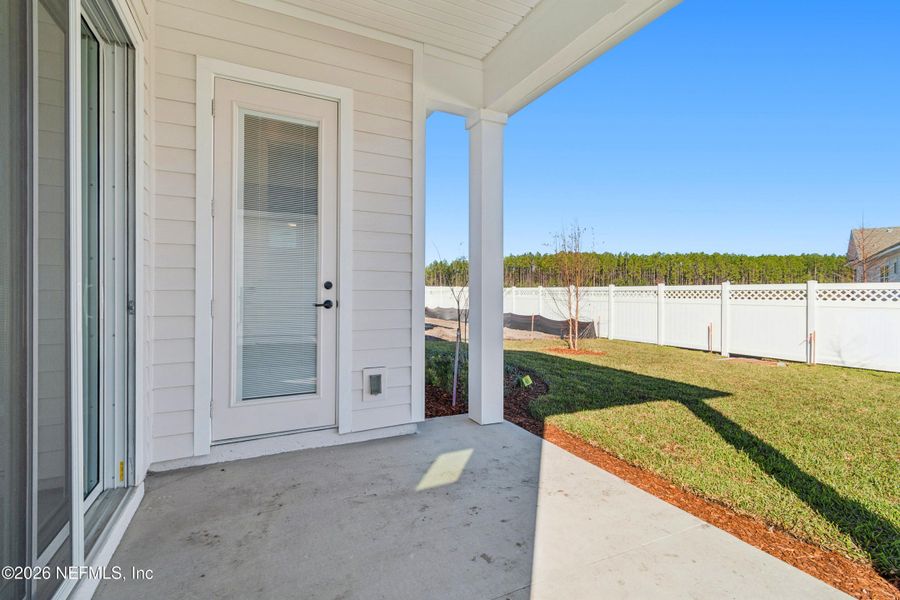 Exterior details and patio area of a home in Evergreen Island at Silverleaf - Executive, St. Augustine (Image 4).