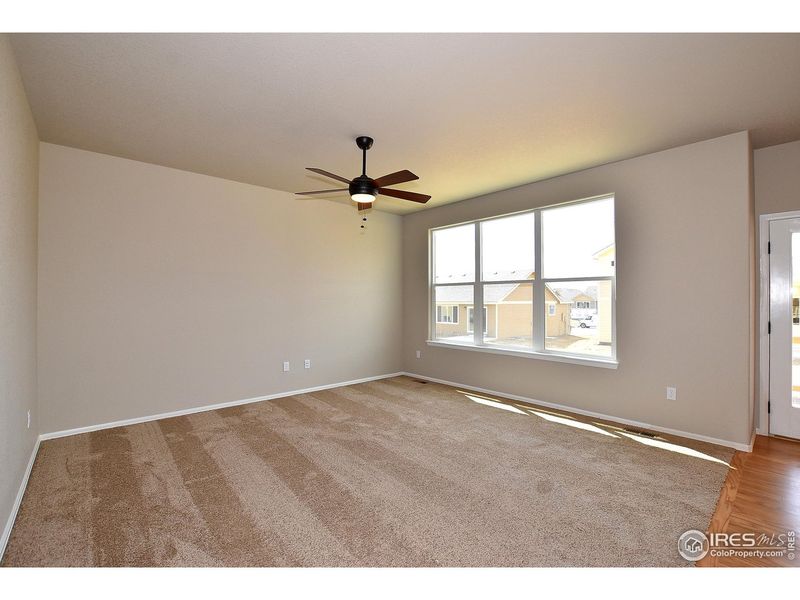 Spacious, unfurnished interior of a new home in Union Colony West, Greeley (Image 31).