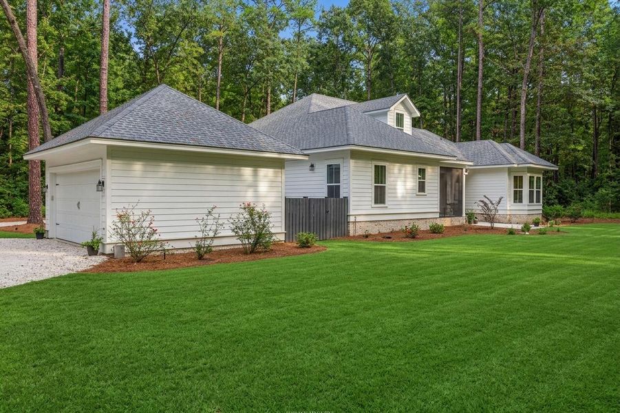 Front exterior of a new home in , Seabrook, SC, highlighting curb appeal (Image 22).