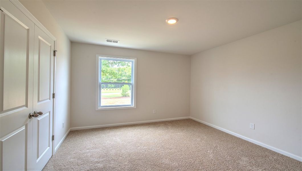 Representative unfurnished interior of a home built from the Savannah by D.R. Horton in Pleasant Grove, Weaverville (Image 25).