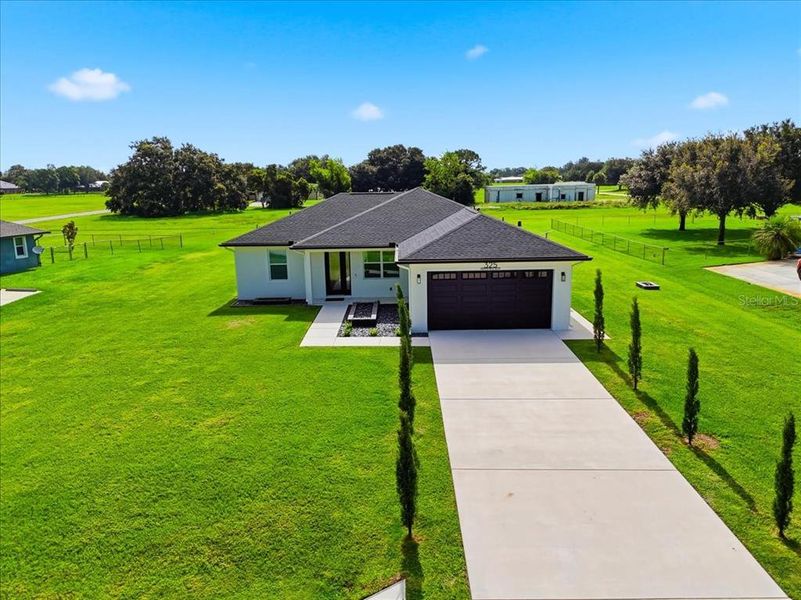 Front exterior of a new home in , Sebring, FL, highlighting curb appeal (Image 23).