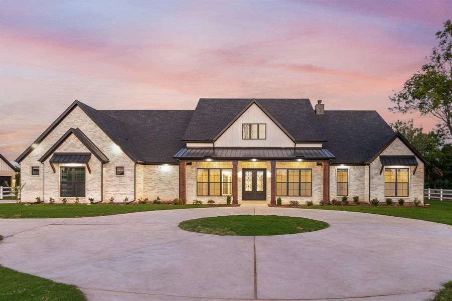 Front exterior of a new home in , McLendon-Chisholm, TX, highlighting curb appeal (Image 22). Front exterior of a new home in , McLendon-Chisholm, TX, highlighting curb appeal (Image 22).