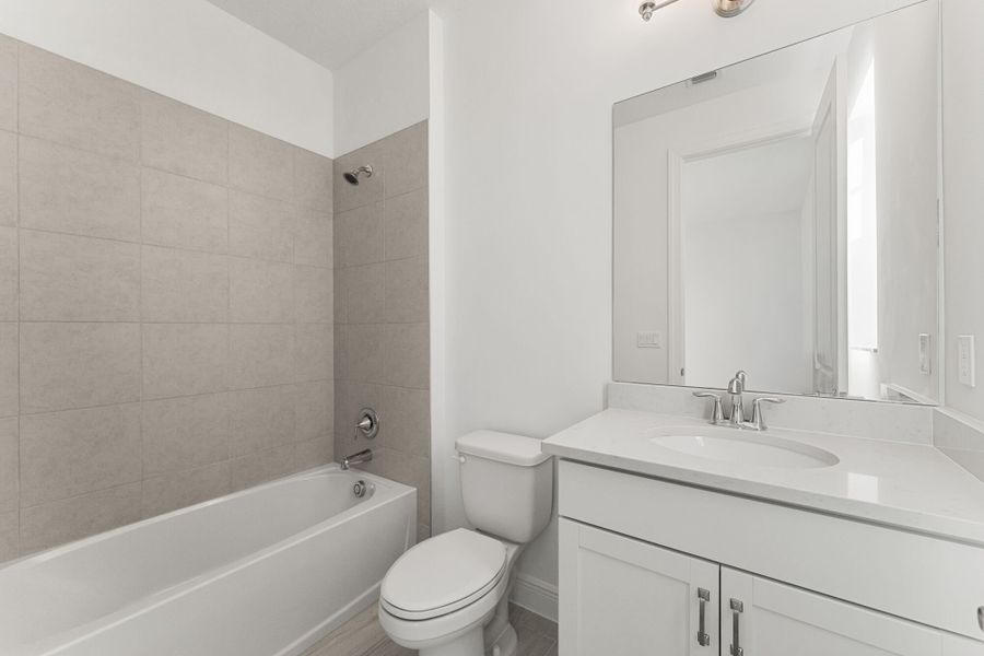 Representative furnished interior of a home built from the Zinnia by Mattamy Homes in Newfield - Rosette Park, Palm City (Image 6).