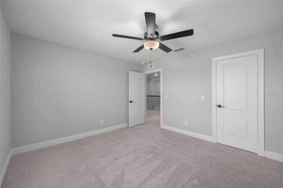 Spacious, unfurnished interior of a new home in Gum Lake Preserve, Lake Alfred (Image 29).
