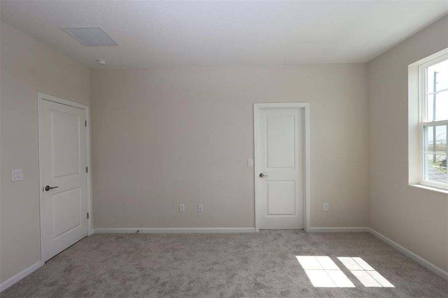 Spacious, unfurnished interior of a new home in Lake Star at Ovation, Winter Garden (Image 19).