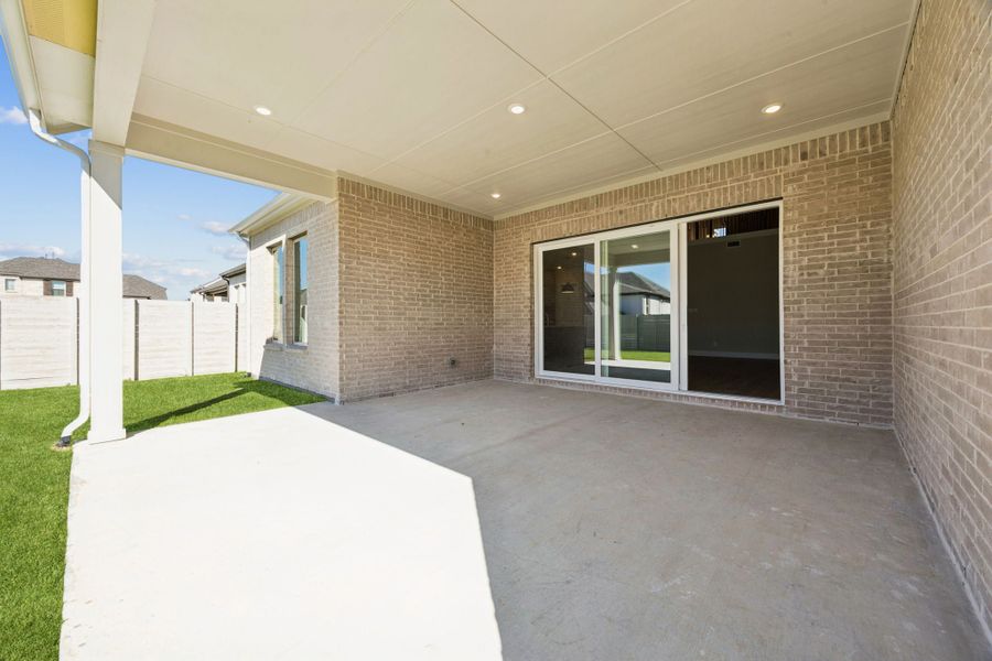 Exterior details and patio area of a home in Painted Tree Lakeside, McKinney (Image 3).
