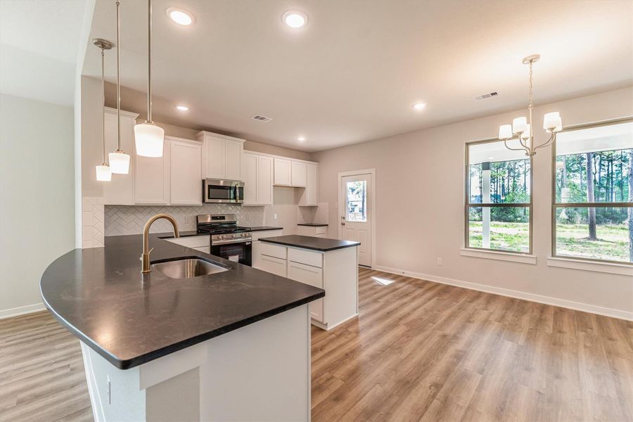 Furnished interior view inside a new home in Deer Pines, Conroe (Image 10).