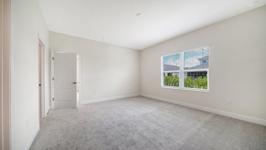 Spacious, unfurnished interior of a new home in Wildleaf at North River Ranch, Parrish (Image 19).