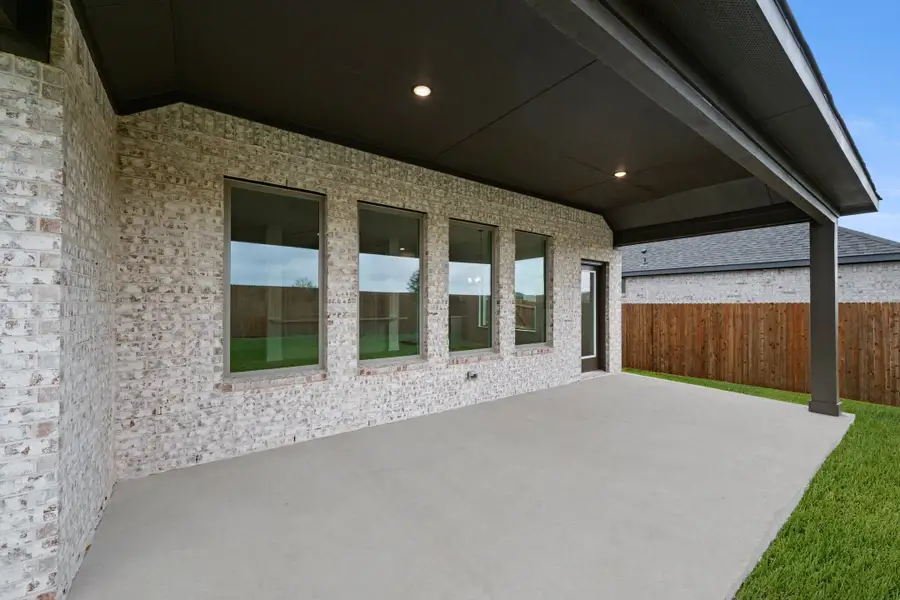 Exterior details and patio area of a home in Vista Point, Grandview (Image 19). Exterior details and patio area of a home in Vista Point, Grandview (Image 19).