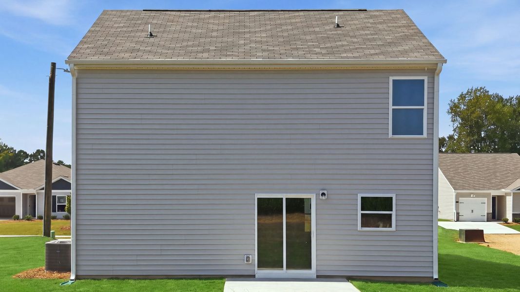 Exterior details and patio area of a home in Hobbs Farm, Ayden (Image 18).