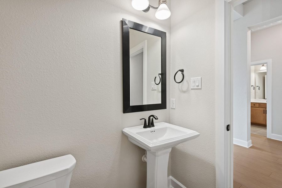 Furnished interior view inside a new home in Meridiana 55' Homesites, Manvel (Image 5).