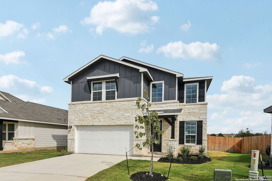 Front exterior of a new home in Estancia Ranch - Premier Series, San Antonio, TX, highlighting curb appeal (Image 23). Front exterior of a new home in Estancia Ranch - Premier Series, San Antonio, TX, highlighting curb appeal (Image 23).