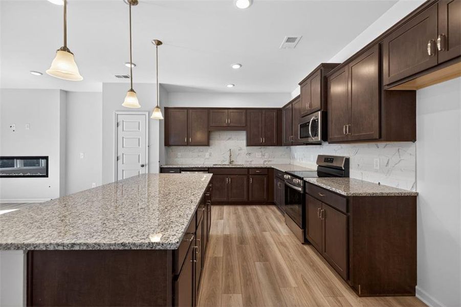 Furnished interior view inside a new home in Jameson Towns, Villa Rica (Image 7).