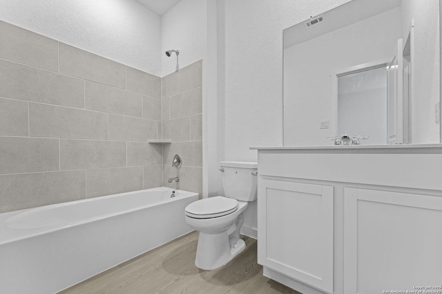 Furnished interior view inside a new home in Hidden Trails: Coastline Collection, Bulverde (Image 9).