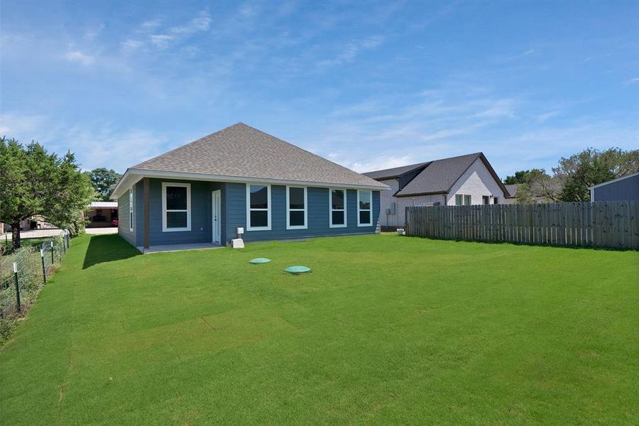 Front exterior of a new home in , Granbury, TX, highlighting curb appeal (Image 12).