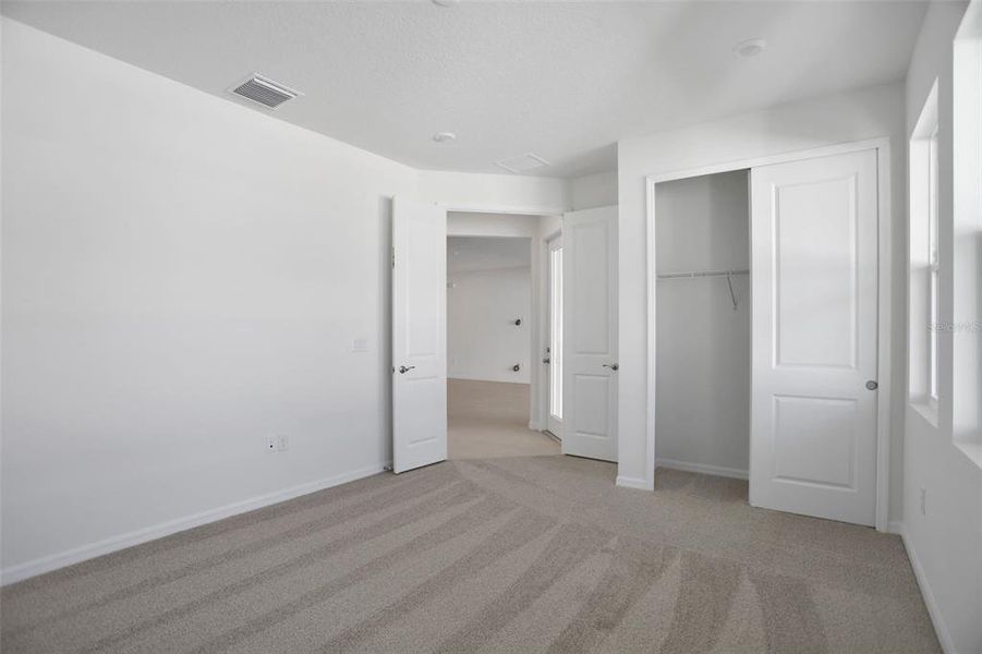 Spacious, unfurnished interior of a new home in Angeline, Land O' Lakes (Image 42).
