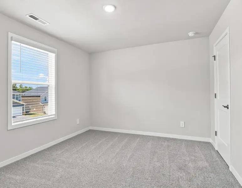 Spacious, unfurnished interior of a new home in Country Lane - Classic Series, Clayton (Image 18).