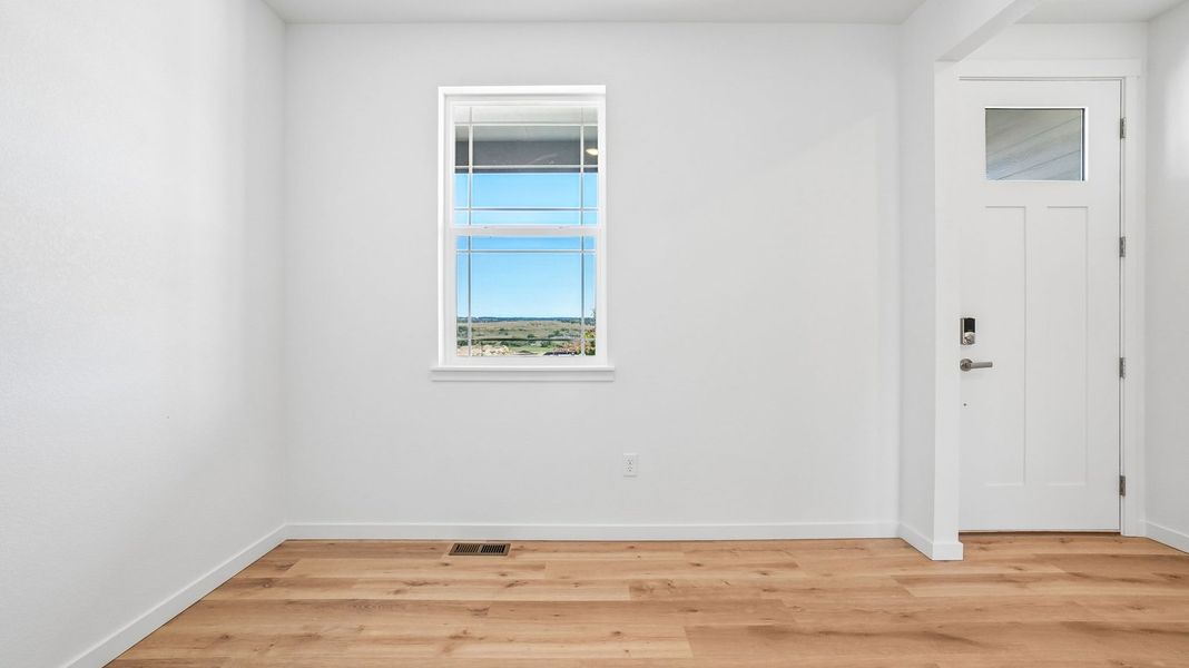 Spacious, unfurnished interior of a new home in Trails at Crowfoot, Parker (Image 12).
