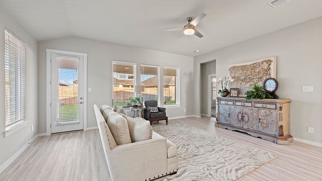 Representative furnished interior of a home built from the Lorenzo by D.R. Horton in Davis Harbor, League City (Image 8).