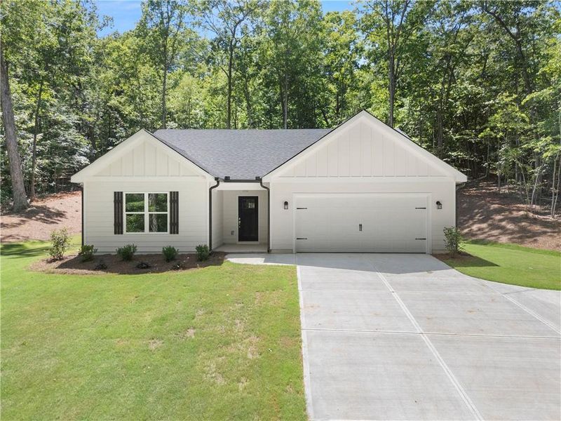 Front exterior of a new home in , Martin, GA, highlighting curb appeal (Image 1). Front exterior of a new home in , Martin, GA, highlighting curb appeal (Image 1).