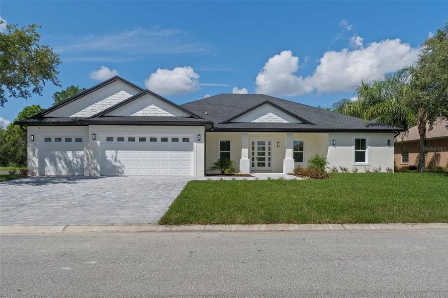 Front exterior of a new home in , Winter Haven, FL, highlighting curb appeal (Image 29).
