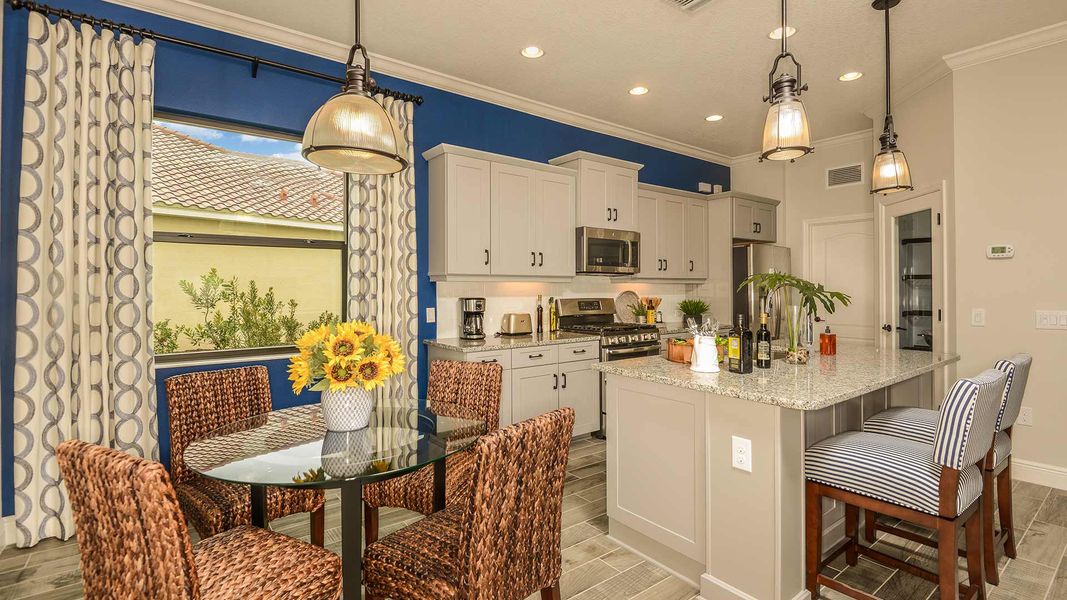 Representative furnished interior of a home built from the Endless Summer 4 by Neal Communities in Boca Royale Golf & Country Club at Wellen Park, Englewood (Image 9).