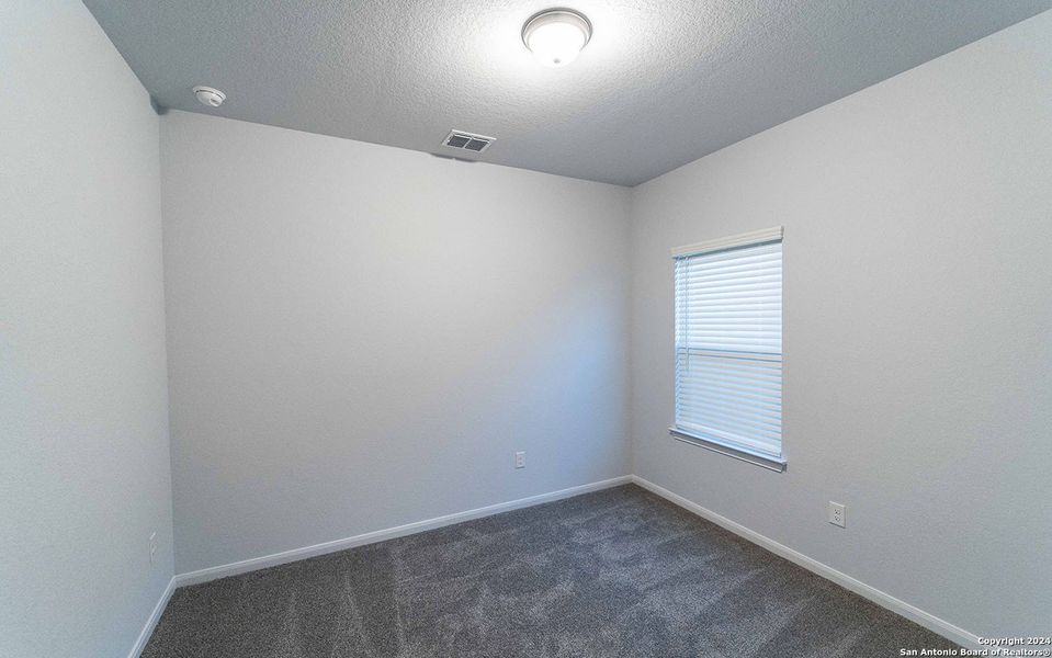 Spacious, unfurnished interior of a new home in Hannah Heights, Seguin (Image 9).