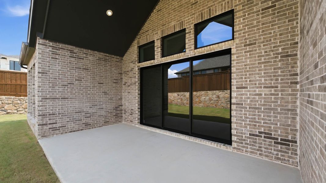 Exterior details and patio area of a home in Terraces, Rockwall (Image 3).