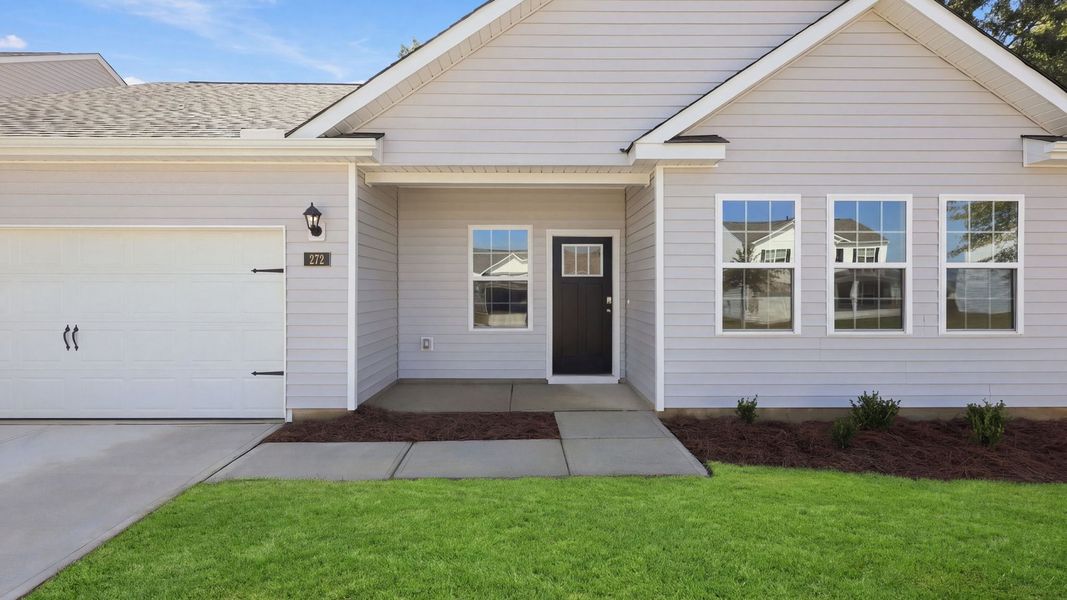 Exterior details and patio area of a home in Tyler - Home on the Lake, New Bern (Image 3).