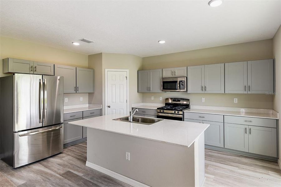 Furnished interior view inside a new home in Pasadena Ridge, Dade City (Image 7).