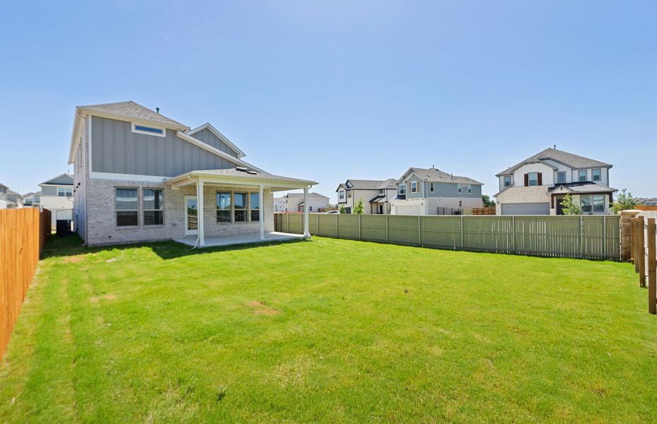 Exterior details and patio area of a home in Santa Rita Ranch, Liberty Hill (Image 24).
