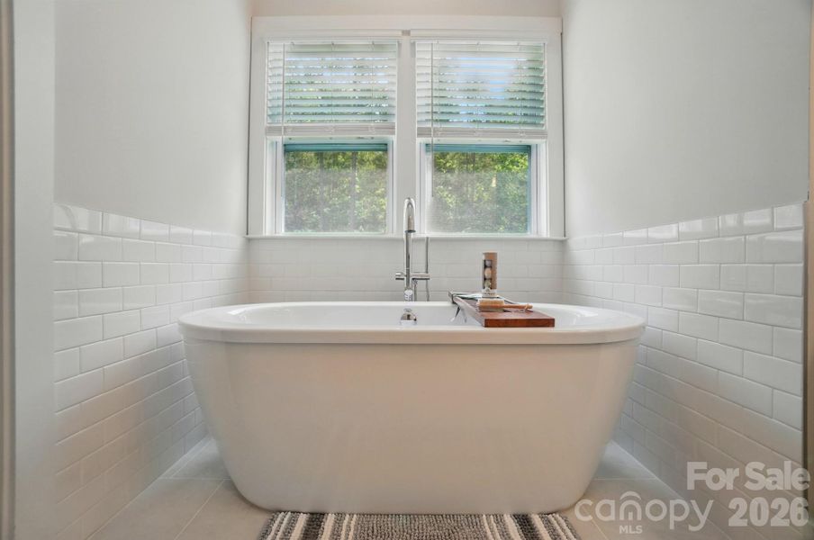 Relax the day away in this soaking tub