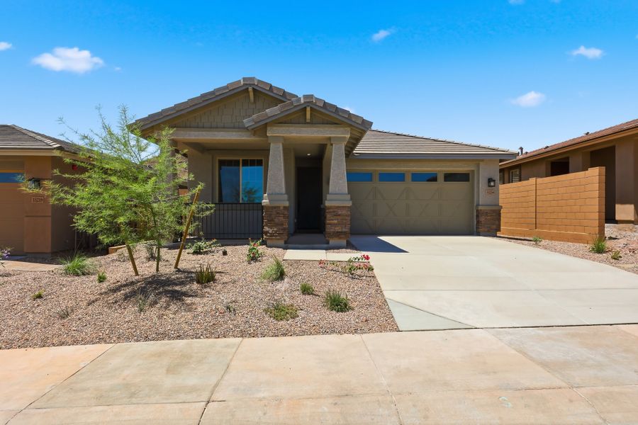 Front exterior of a new home in Highpointe at Northpointe, Peoria, AZ, highlighting curb appeal (Image 1). Front exterior of a new home in Highpointe at Northpointe, Peoria, AZ, highlighting curb appeal (Image 1).