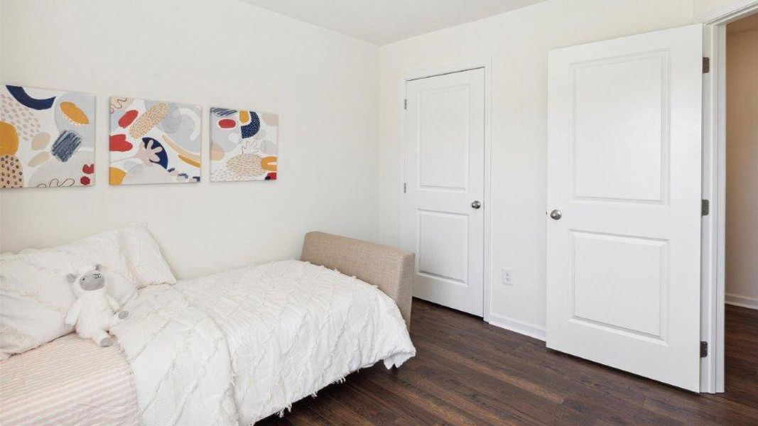 Representative furnished interior of a home built from the Altamont Townhome by D.R. Horton in Belcourt Landing, Cleveland (Image 16).