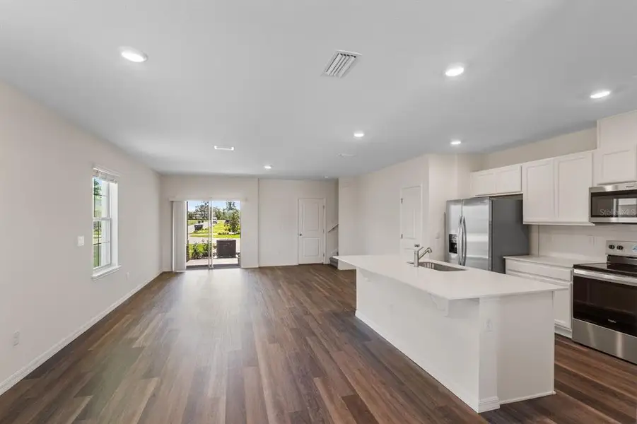 Furnished interior view inside a new home in Waterleigh, Winter Garden (Image 13).