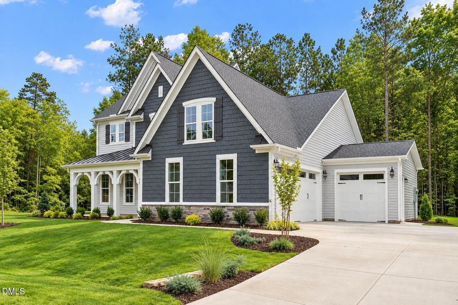 Front exterior of a new home in Baylee Ridge, Selma, NC, highlighting curb appeal (Image 17).