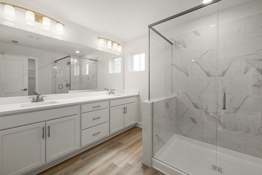 Representative furnished interior of a home built from the Charlton by UnionMain Homes in Austin Springs, Bethlehem (Image 9).