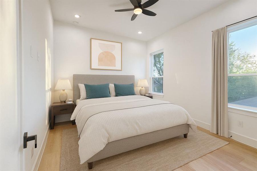 Bedroom featuring light wood finished floors, recessed lighting, and a ceiling fan